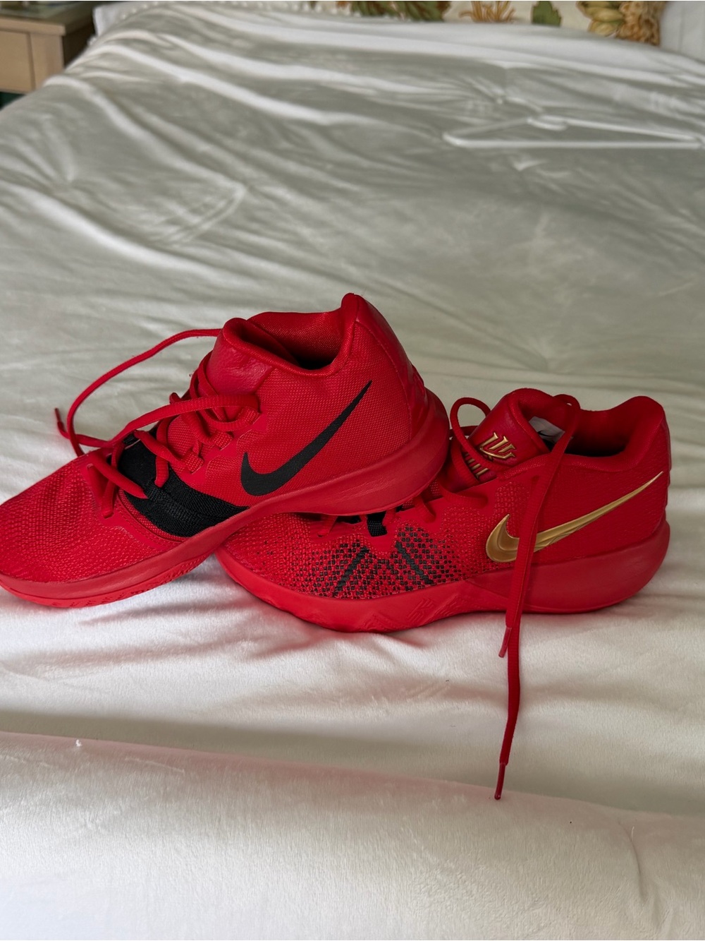 Nike Kids Red Sneakers with Black and Gold Swooshes